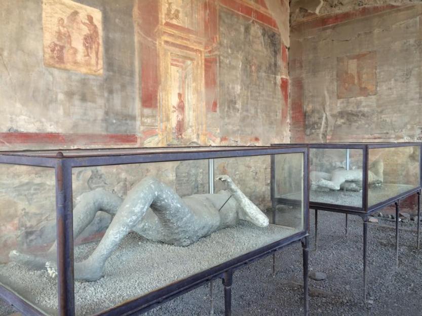 This image speaks for itself. In this square was a large commercial center where merchants would advertise their products through painted frescoes on the walls. These were actual people who were frozen instantly by the volcanic ash following Mount Vesuvius' eruption.