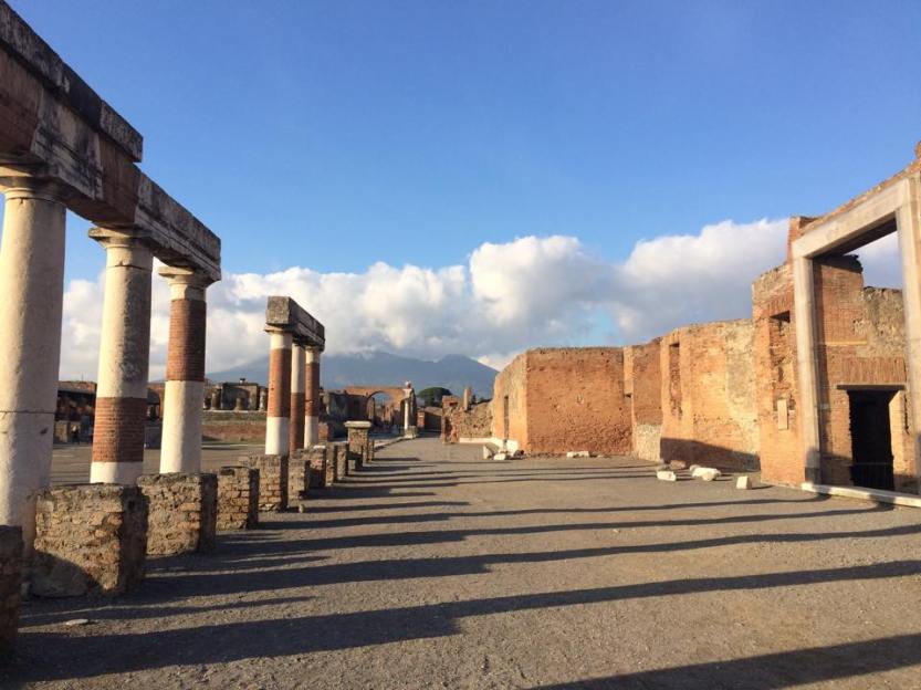The city center of Pompeii with Vesuvius pictured in the background.