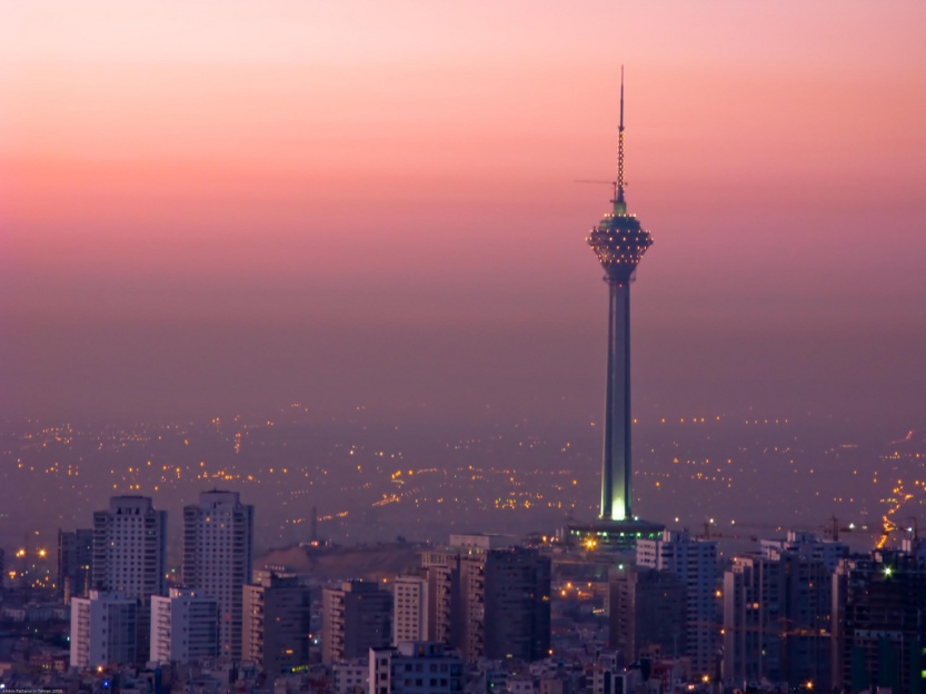 Tehran skyline at sunrise, featuring the Milad Tower. Photo courtesy of Flickr user Afshin Rattansi.
